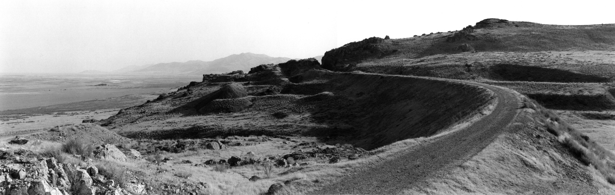 For many miles in northern Utah, the Central Pacific, building east from Sacramento, Calif., and the Union Pacific, building west from Omaha, Neb., constructed parallel embankments as they pocketed government construction payments and before the final meeting point was set for Promontory. A few miles east of Promontory, the Central Pacific crossed a deep stream bed on what became known as the Big Fill. At this same gap, the Union Pacific built — what else? The Big Trestle. The embankments leading to the long-ago-demolished bridge are seen on the left.