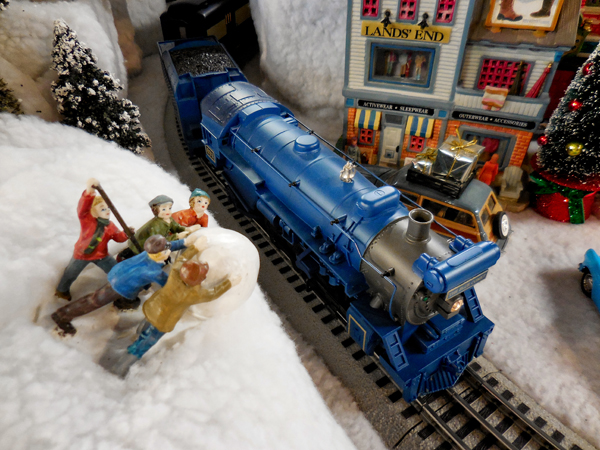 blue model locomotive on layout