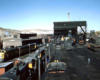 Trains sitting at a rail yard