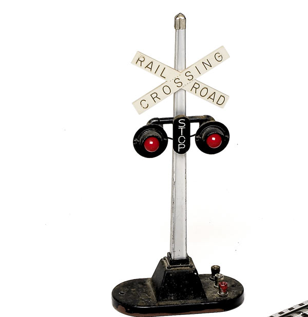 black, white, and red toy signal