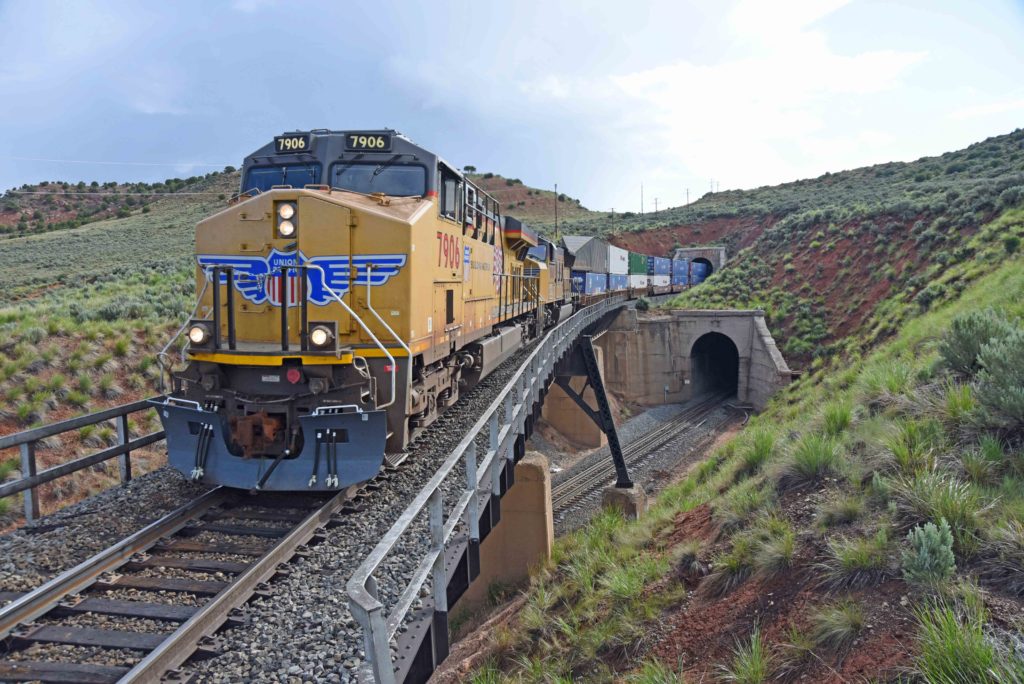 A westbound Union Pacific intermodal train is seen at Curvo in Utah, along the first Transcontinental Railroad.