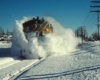 A train plowing through the snow