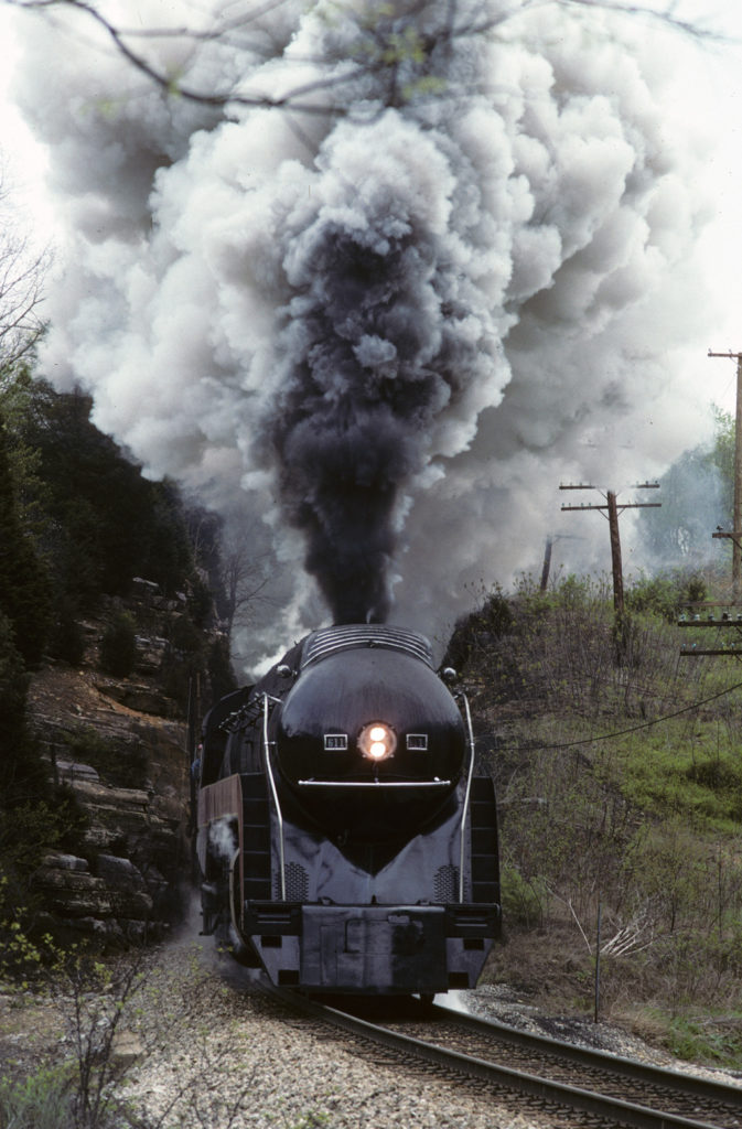 streamlines steam locomotive with huge smoke plume