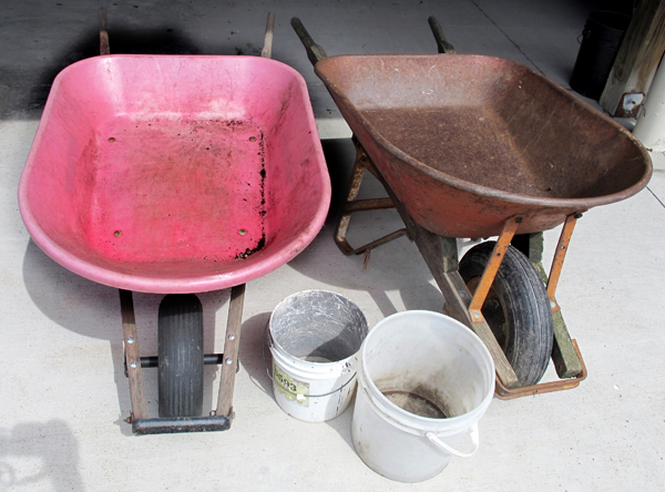 21 must-have gardening tools: two wheelbarrows and two buckets