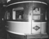 A couple of women looking out the back of an observation car