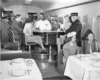 People in a restaurant diner car