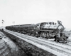 a steam engine passenger train