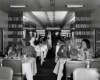 people dining in a dining car