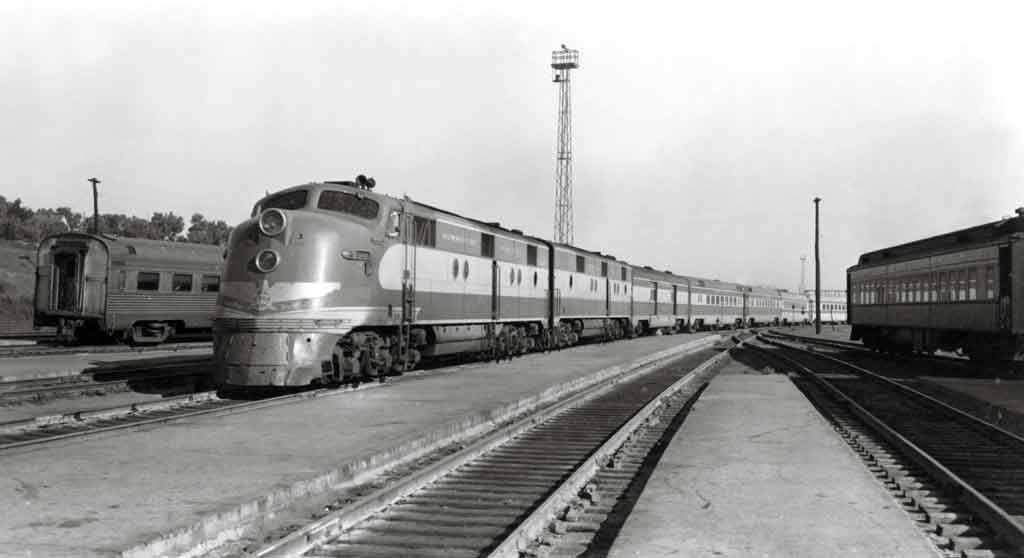Diesel locomotives with passenger train in coach yard