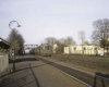 A commuter train approaching a train station