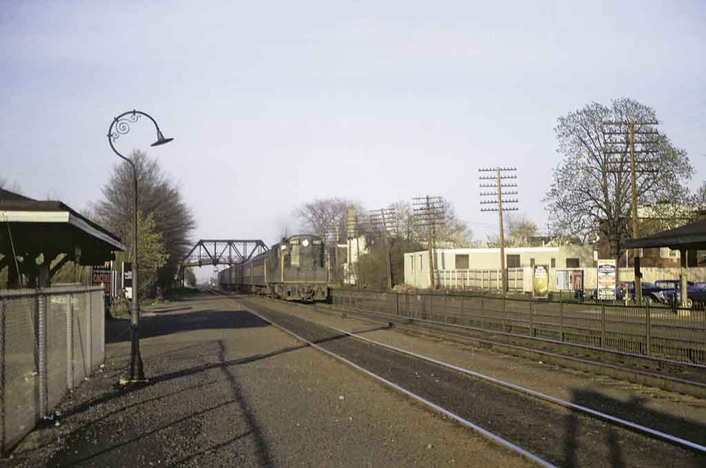 A commuter train approaching a train station