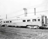 A close up picture of a locomotive sitting on the track