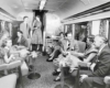 Passengers in a lounge car