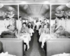 Patrons seated in dining car