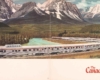 Brochure showing streamlined train on curve by mountains