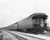 A black and white photo of the back of a locomotive