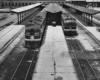 two trains parked at a station