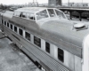 A black and white close up picture of the top of a train