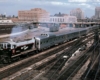 A train passing through a busy city