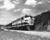 Diesel locomotive with passenger train