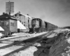 a diesel passenger train by a junction