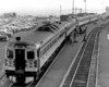 people boarding a passenger train