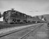 A black and white photo of a locomotive 