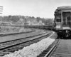 A black and white picture of the back of a caboose