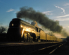 A train passing by during sunset