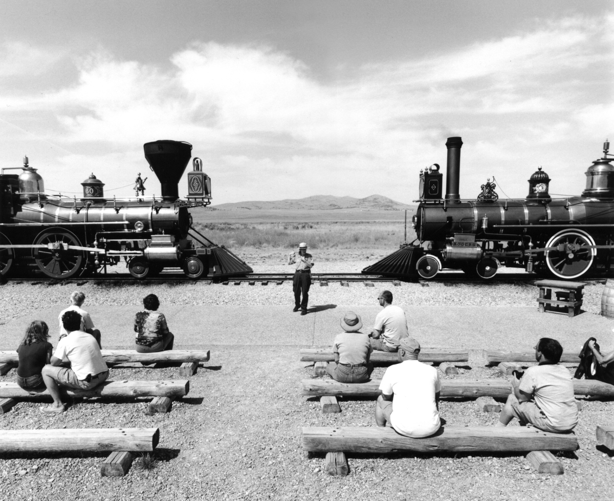 In a scene reminiscent of A. J. Russell's photograph of the driving of the Golden Spike at Promontory Summit in May 1869, the Central Pacific's 