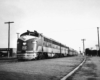 a diesel pulling passenger cars