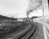 a diesel passenger train rounding a curve