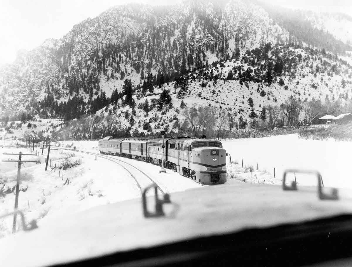 two diesel passenger trains about to pass each other