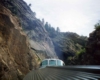 the top of an observation car in a canyon