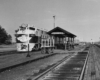 a diesel passenger train at a depot