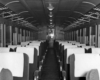 the interior of an empty coach car