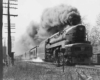 A train passing by with big black smoke