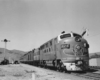 A diesel pulling passenger cars