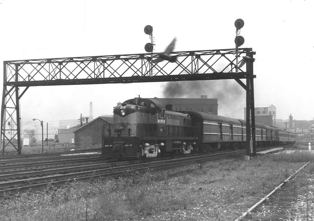 a diesel pulling passenger cars