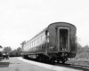 a passenger train at a passenger depot