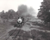 A black and white photo of the locomotive 4-6-0 416 on the tracks