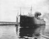 A car ferry traveling across the water