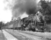 Steam locomotive with passenger train