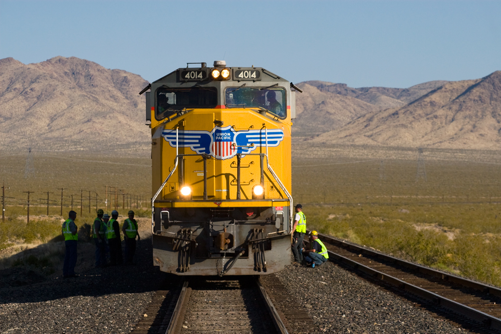A head on shot of big boy surrounded by workers