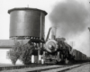 A train passing a water tower