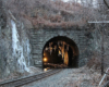 A train tunnel with icicles hanging off it