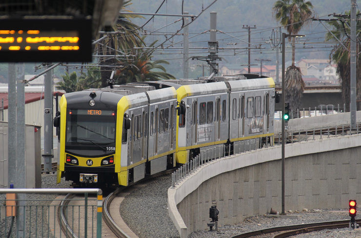 LA Metro light rail train on curving bridge