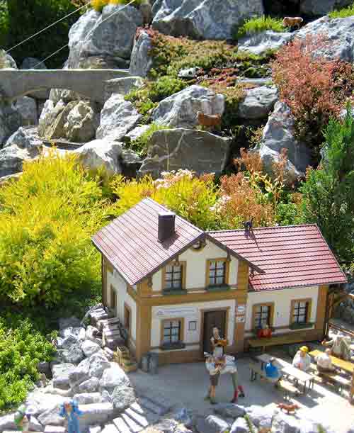scene with house on garden railway