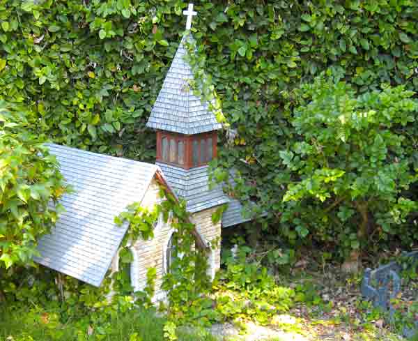 church with plant around it