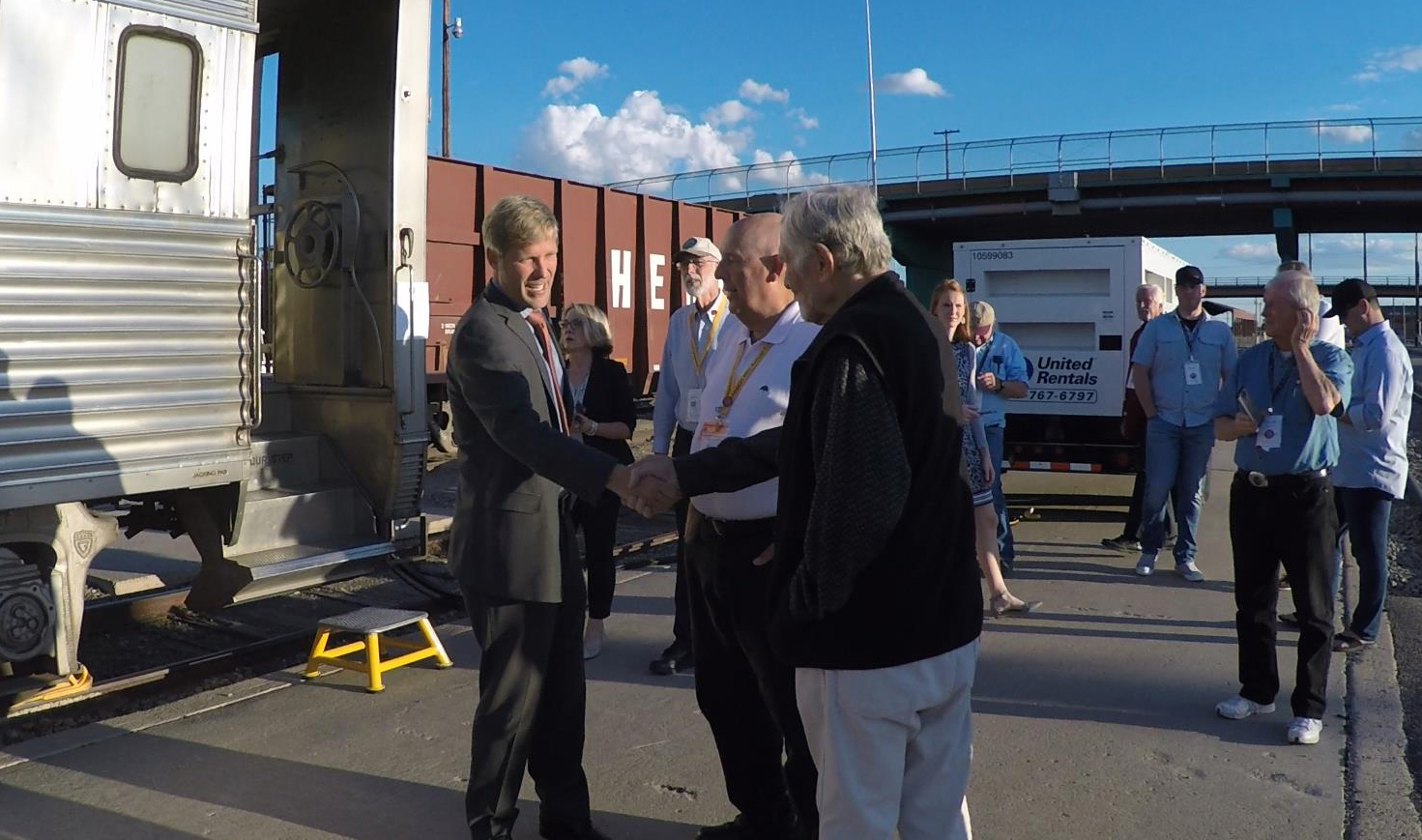 Albuquerque Mayor Tim Keller greets AAPRCO members before touring the private cars at the Albuquerque Transportation Center.